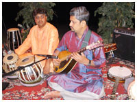 Accompanying mandolin player Snehashish Majumder at Whittier College, Whittier, CA